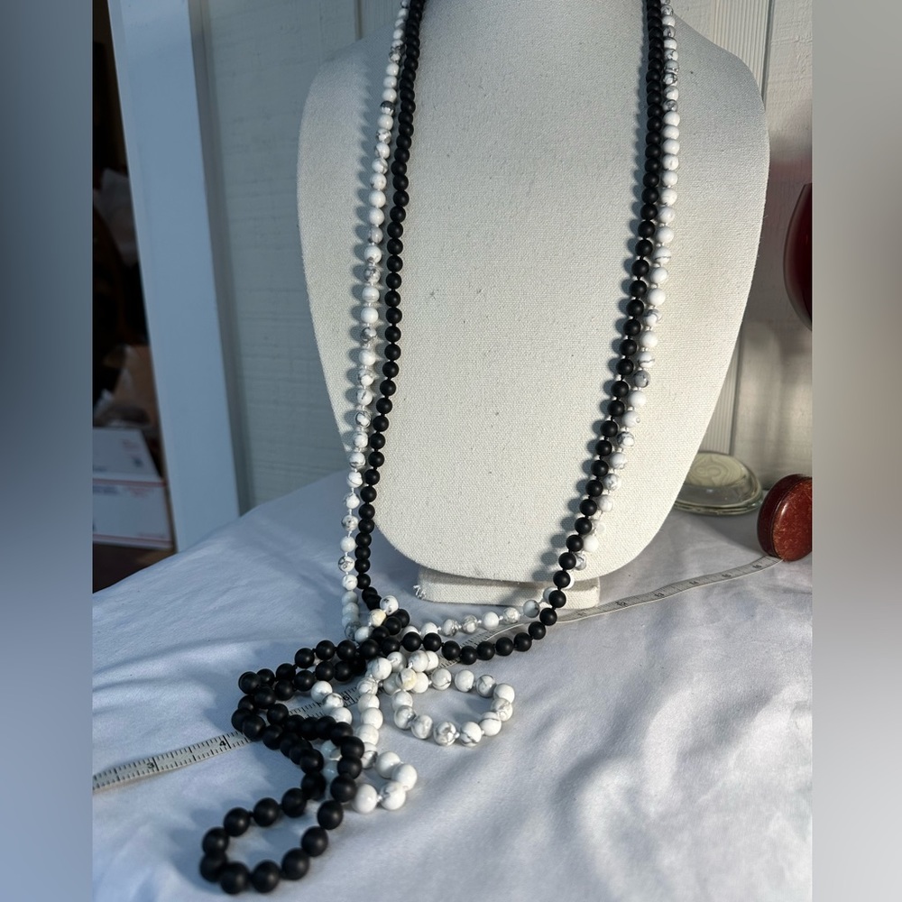 Long black agate and howlite necklaces